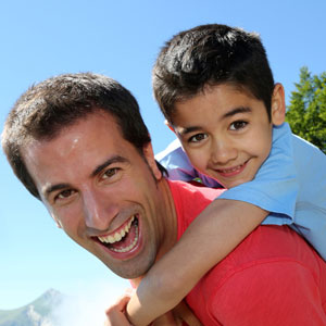 father and son wearing contact lenses